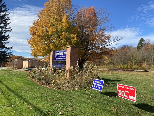 Dueling signs in front of Burlington High School's Institute Road campus - ALISON NOVAK ©️ SEVEN DAYS