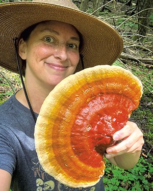 Meg Madden with a reishi mushroom - COURTESY OF MEG MADDEN