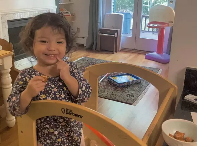 Malia using her learning tower - MARIA MUNROE