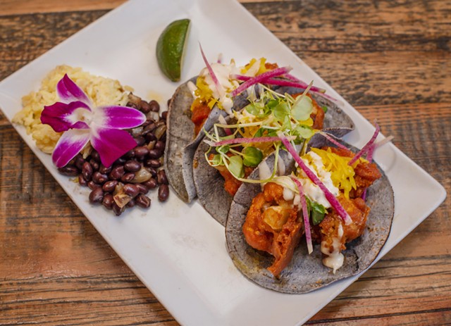 Buffalo cauliflower tacos with turmeric slaw and blue cheese crema at Revolution Kitchen - FILE: GLENN RUSSELL