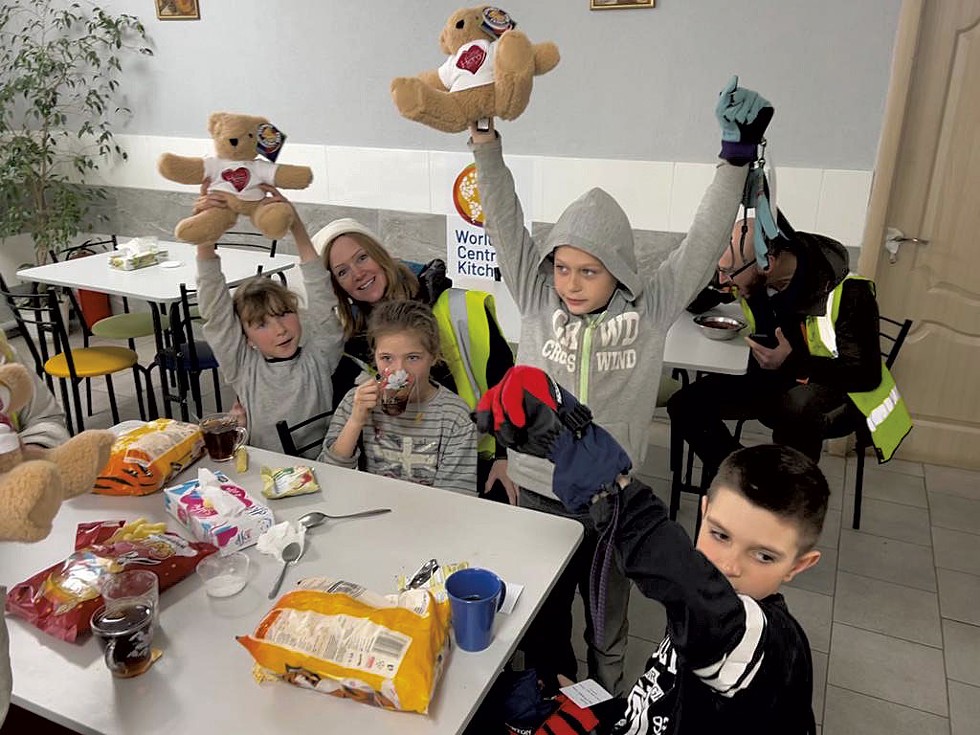 Americans delivering Vermont Teddy Bears and Burton gloves to a shelter in western Ukraine - COURTESY