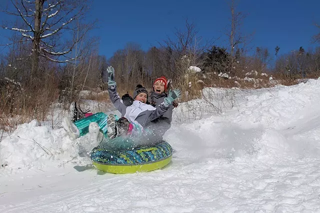 Backyard sledding in Jericho - KIRSTEN THOMPSON