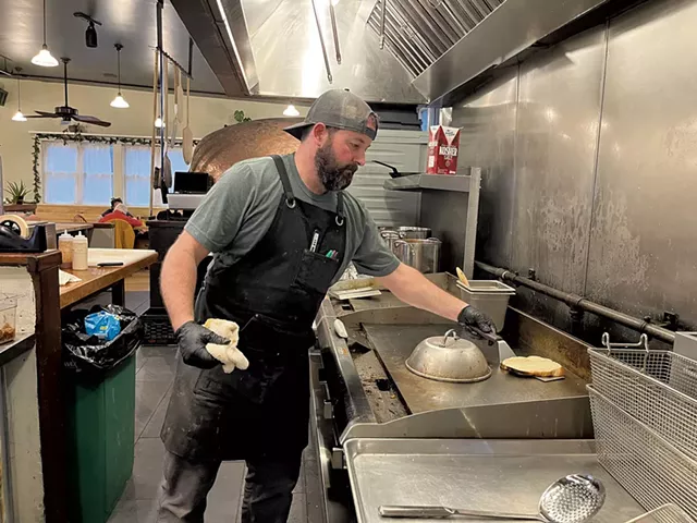 Kevin Archambeault in the kitchen at ShireTown - JORDAN BARRY ©️ SEVEN DAYS