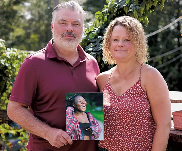 Al and Debbie Wood with a photo of their daughter Naomi - BENJAMIN DEFLORIO