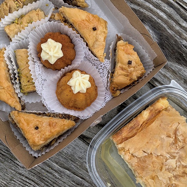 Galaktoboureko (bottom right) and other pastries from the Greek Orthodox Church bake sale - MELISSA PASANEN