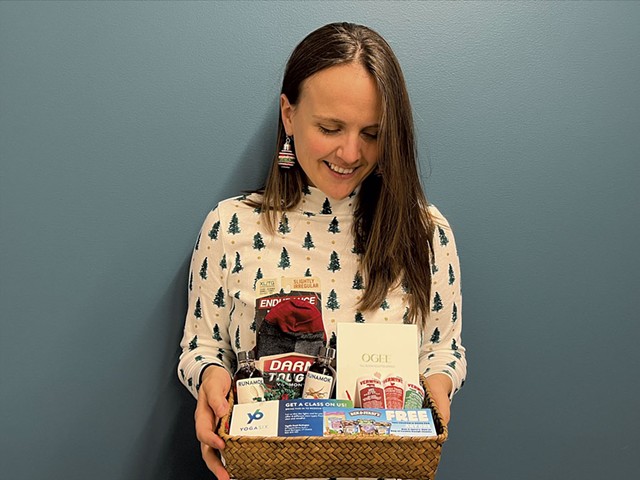 Sarah Oughton with Twincraft Skincare's Vermont employee gift basket - COURTESY