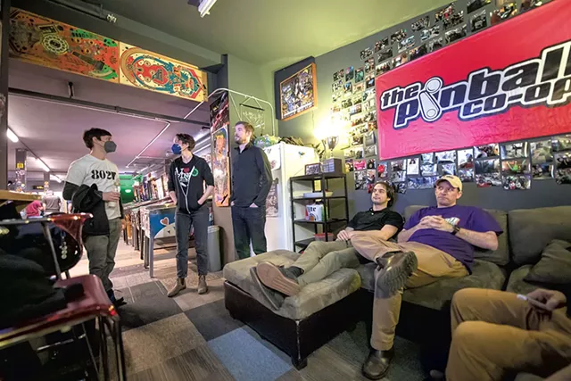 From left: Mat Barewicz, Emily May, Eric Marz, Nathan Crosby and Mike Havens watching the live stream of a game - DARIA BISHOP