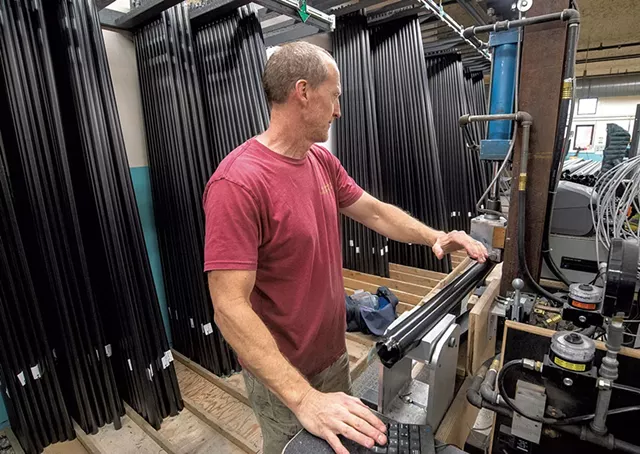 Bill Cleary testing oars - JEB WALLACE-BRODEUR