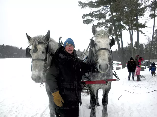 Pat Palmer with two of his Percherons - COURTESY OF MARSHALL WEBB/SHELBURNE FARMS