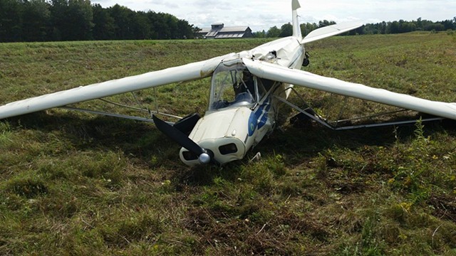 The crashed Piper PA-11 on the Savage Island runway - COURTESY