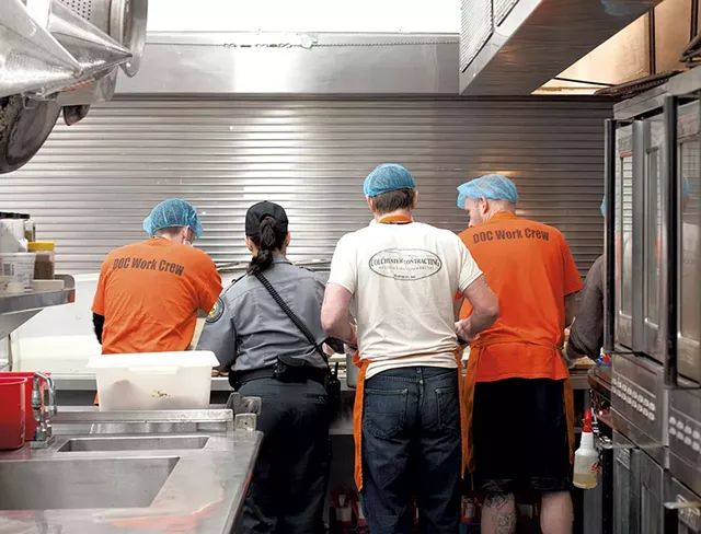 Dinner service line at Northeast Regional Correctional Facility - HANNAH PALMER EGAN