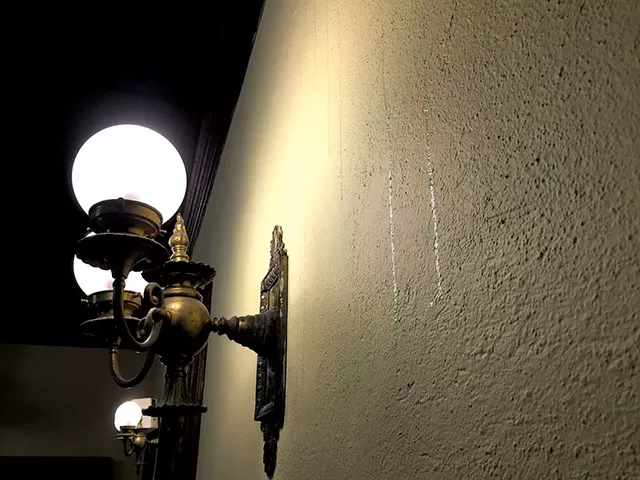 Honey dripping down the church wall - MEGAN JAMES