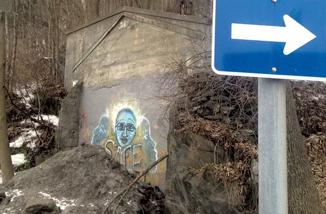 Mystery wall at the intersection of Northfield Street and Memorial Drive in Montpelier - KEN PICARD