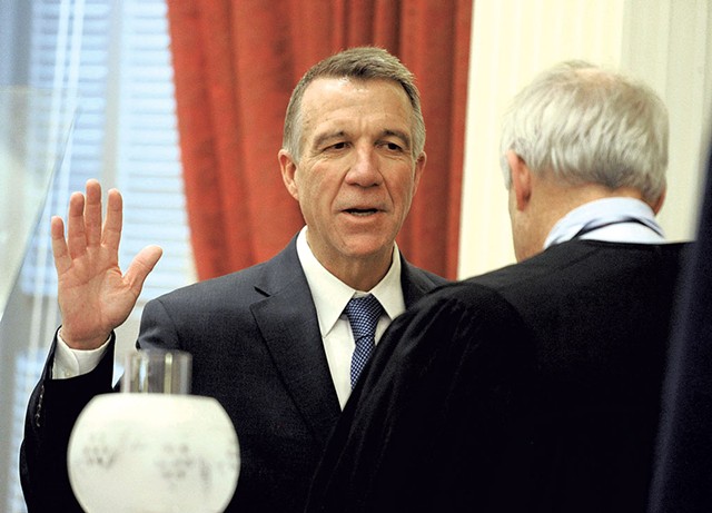 Phil Scott taking the oath of office in January - FILE: JEB WALLACE-BRODEUR