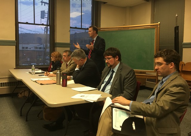 Attorney General T.J. Donovan speaking behind committee members. From left: Madeline Motta, Jake Perkinson, Brady Toensing and Josh Wronski. At right is state elections director Will Senning. - JOHN WALTERS