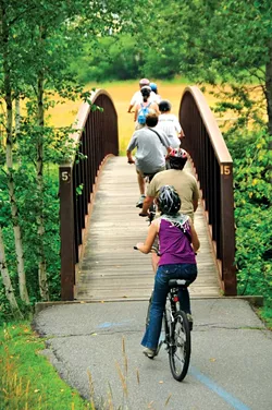 Biking the Stowe Recreation Path - FILE: JEB WALLACE-BRODEUR