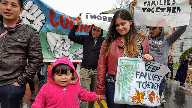 Cesar Alex Carrillo, left, with his young daughter and wife, leading a 2016 march to urge the release of a migrant worker. - COURTESY: MIGRANT JUSTICE