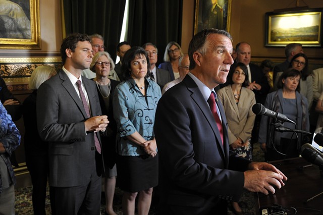 Gov. Phil Scott announces an agreement at the Statehouse Wednesday. - JEB WALLACE-BRODEUR