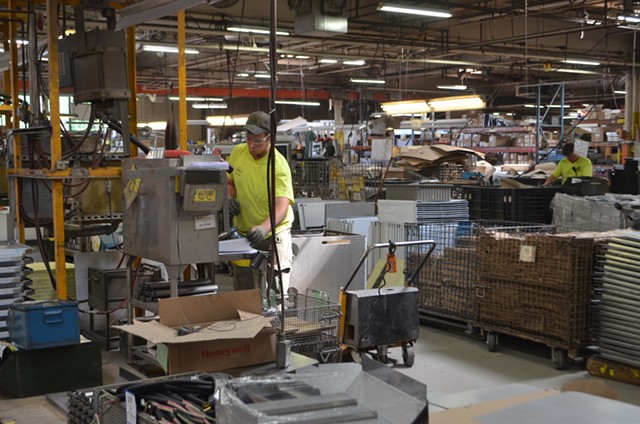 A Blodgett employee works in the assembly line - KATIE JICKLING