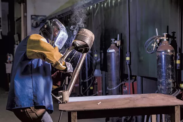 An instructor working at the Advanced Welding Institute - OLIVER PARINI
