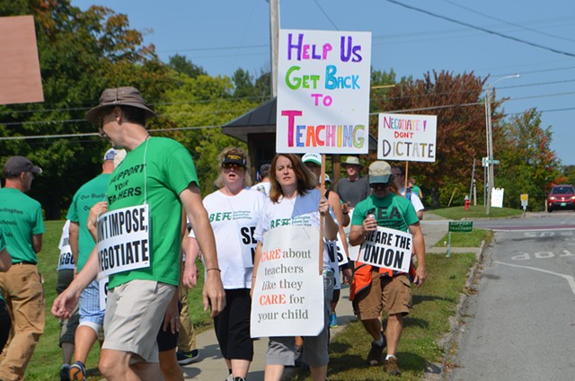 Teachers picketing in front of Burlington High School Friday - KATIE JICKLING