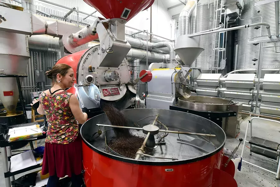Anji Heath running the large roaster - JEB WALLACE-BRODEUR