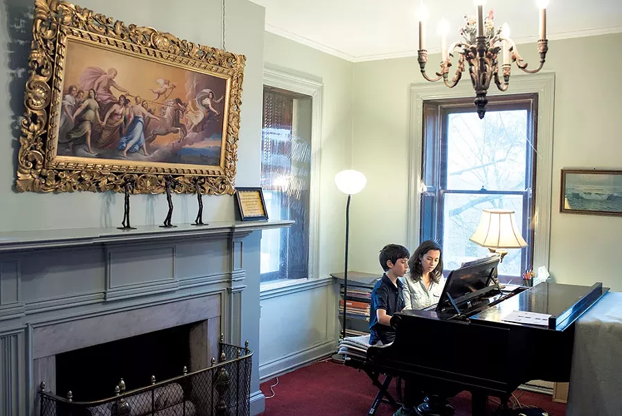 Sadie Brightman teaching piano to Jacob Graham - CALEB KENNA