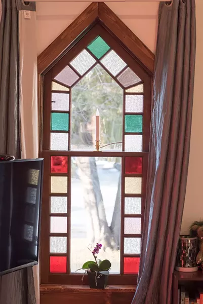One of the home's stained-glass windows - CALEB KENNA
