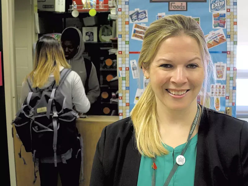 Courtney Poquette in front of the student-run school store, a business class project - MATTHEW THORSEN