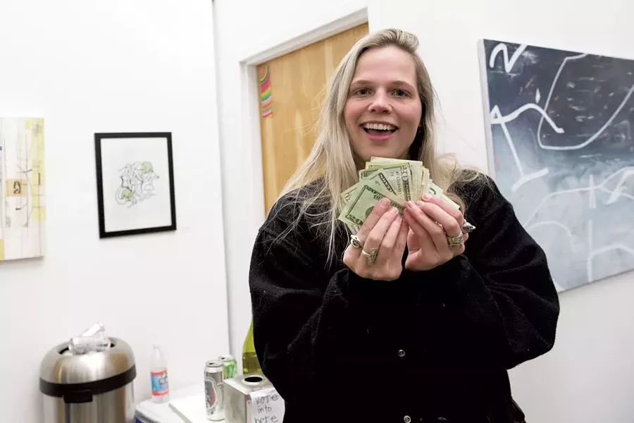 Maggie Kniffin and with her winnings from “