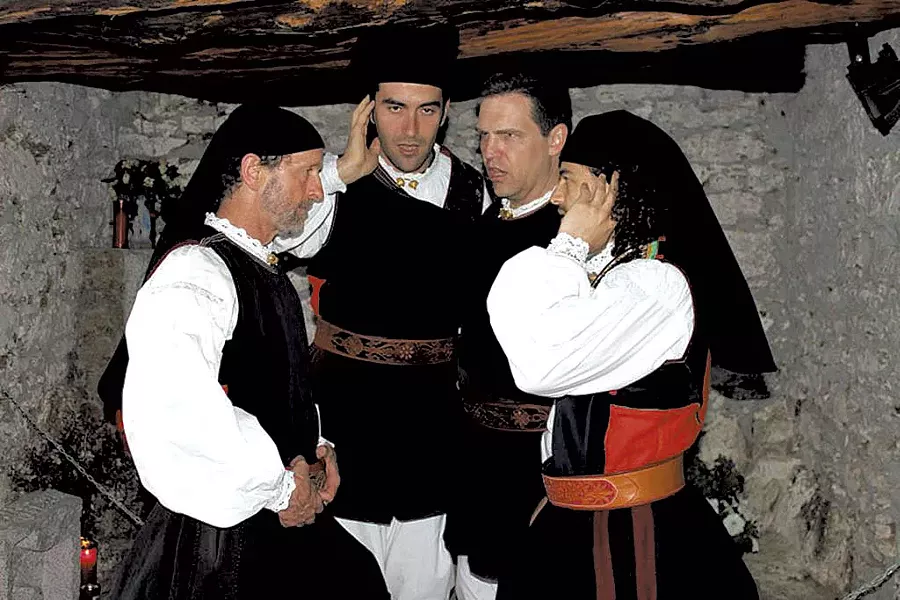 Tenores de Aterúe singing in a cave in Sardinia - COURTESY OF DOUGLAS PAISLEY