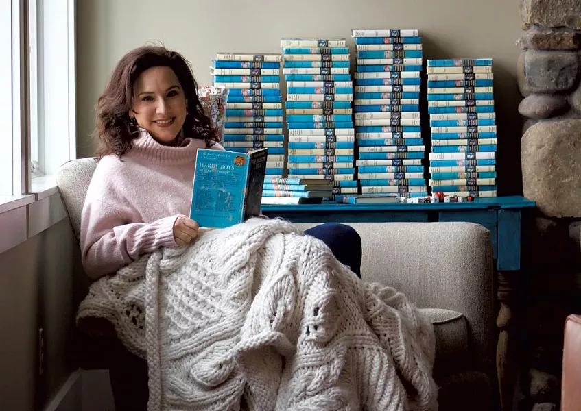 Palmisano with her Hardy Boys and Nancy Drew book collection - COURTESY OF GABRIELLE BOOTH