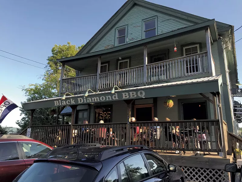 Front porch dining at Black Diamond Barbeque - SALLY POLLAK