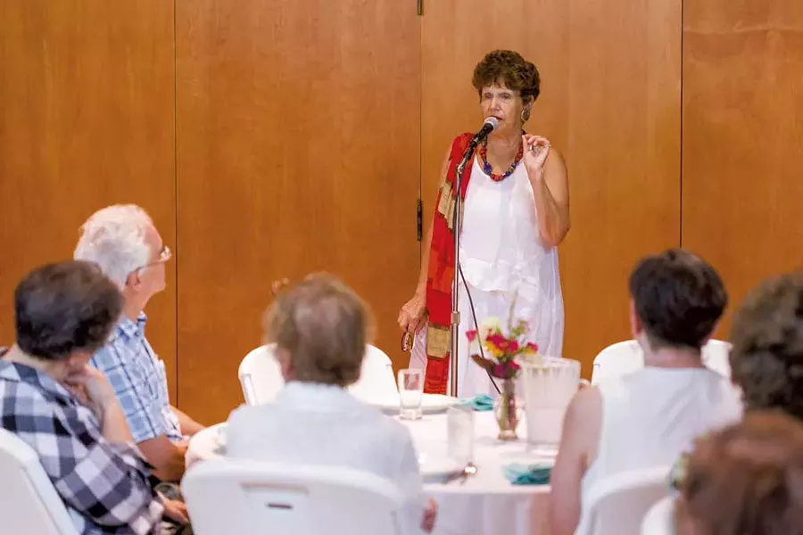Cookbook author Joan Nathan speaking before the meal - OLIVER PARINI