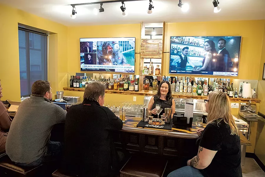 Melissa Jayne tending bar - JAMES BUCK