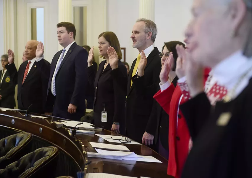 Members of the Senate take their oaths of office. - JEB WALLACE-BRODEUR
