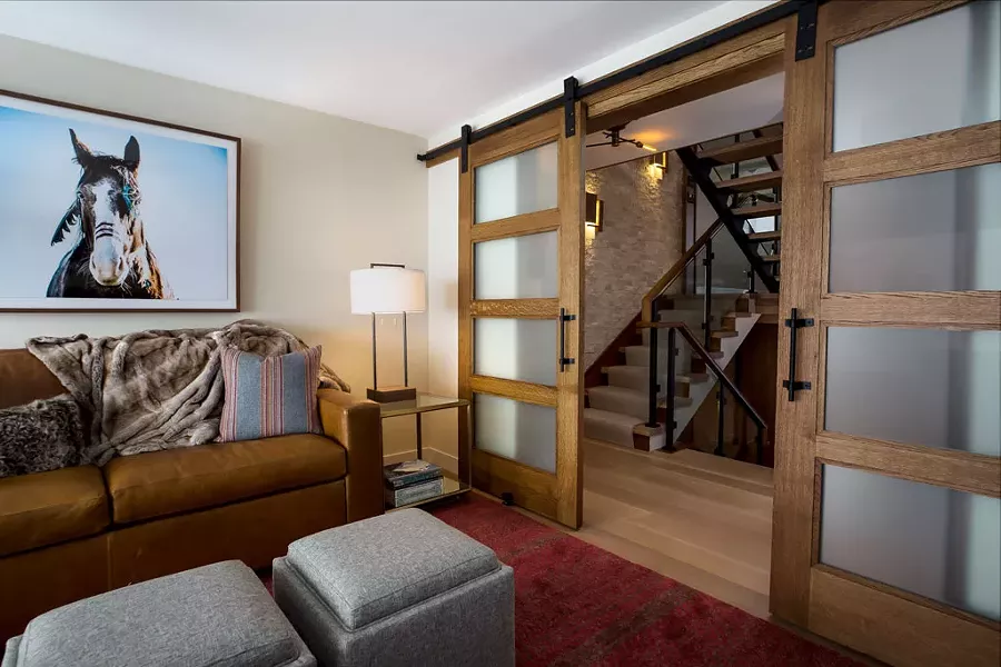 Family room at a ski condo in Stowe designed by Maher - COURTESY OF LINDSAY RAYMONDJACK