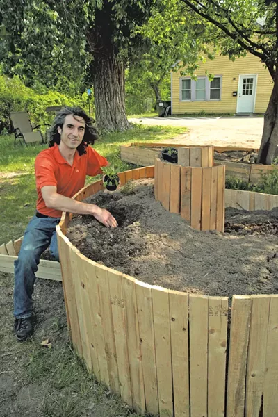 Amos Meacham in the garden of the Soteria house - MATTHEW THORSEN
