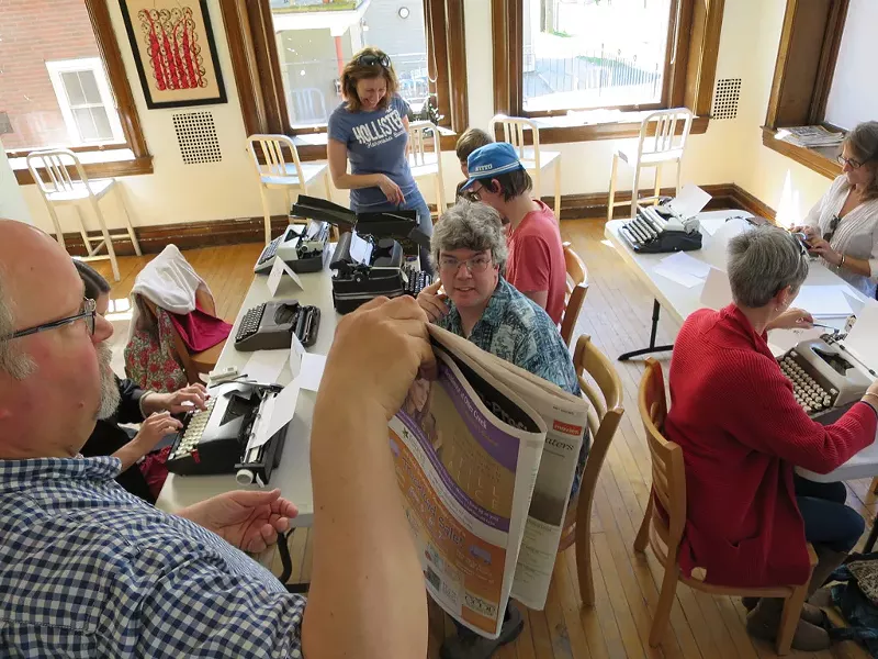 David Wells leads typists in an exercise at Maglianero Café - MATTHEW THORSEN