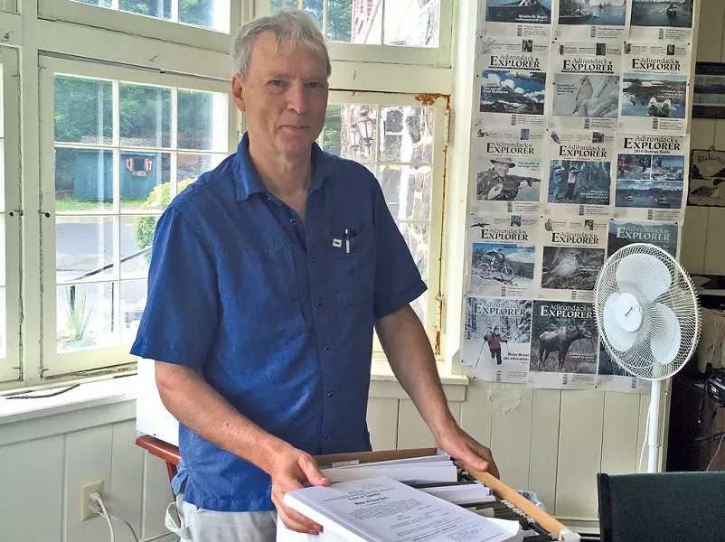 Phil Brown with court documents - ALICIA FREESE