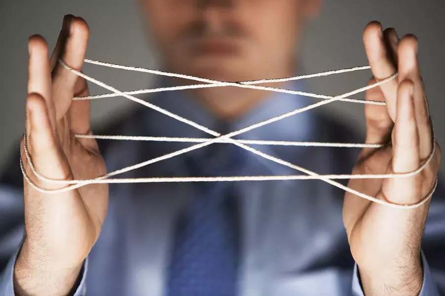 Cat's cradle - DREAMSTIME