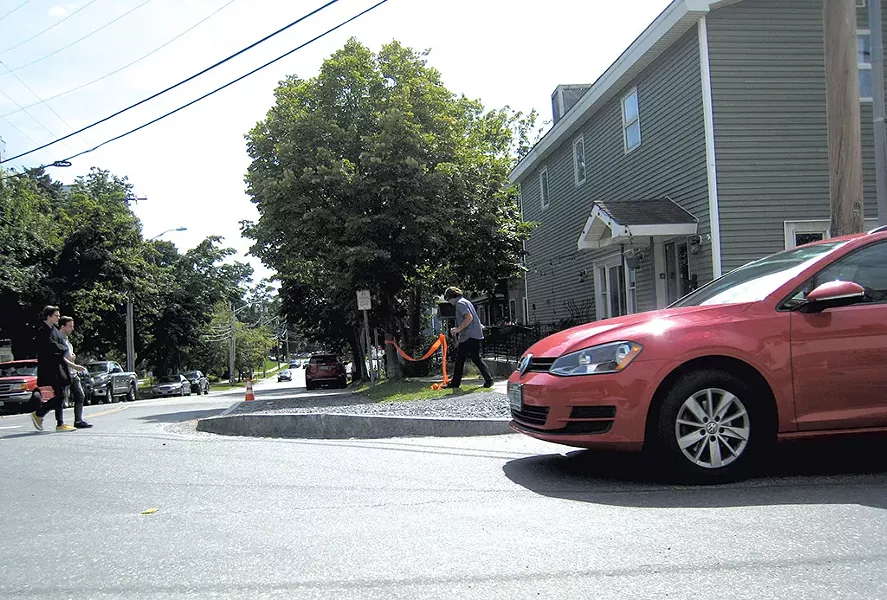 The curb at St. Paul and Maple streets - DIANE SULLIVAN