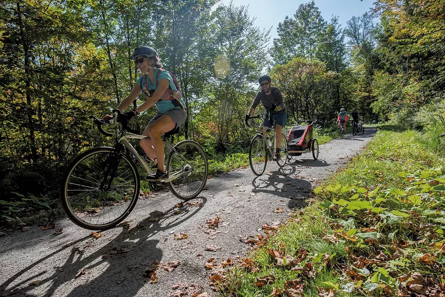 Bikers on the Lamoille Valley Rail Trail - GLENN RUSSELL
