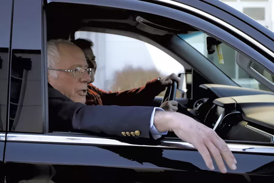 Sen. Bernie Sanders leaving Burlington International Airport Saturday - STEVEN SENNE/AP
