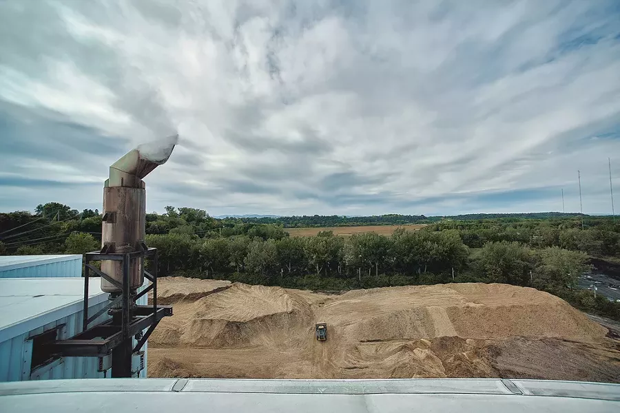 Woodchip piles outside McNeil