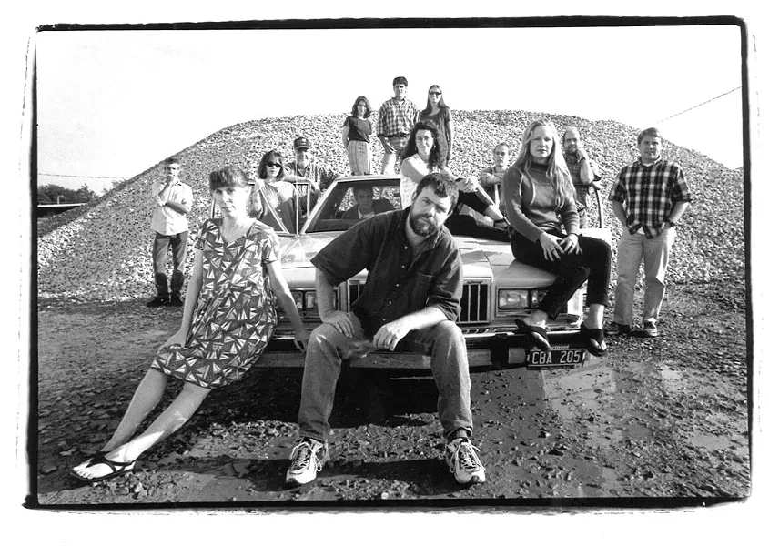 BACK ROW: Matthew Thorsen, Pamela Polston, Peter Freyne, Lucy Howe, Rob Cagnini, Eve Jarosinski, Erik Esckilsen, Peter Kurth, Josh Highter. - IN CAR: Glenn Severance. - ON CAR: Michelle Brown, Rick Woods, Paula Routly, Samantha Hunt.