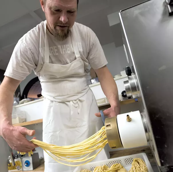 An employee at Mama's Hand Made Italian - FILE: TOM MCNEIL