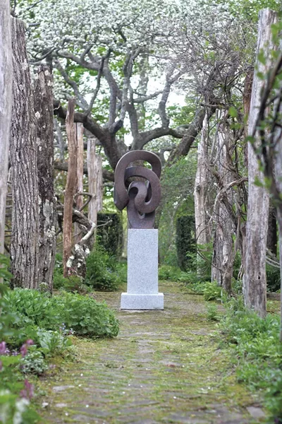 "Locus" sculpture by Miles Chapin in Westminster West garden - COURTESY PHOTO