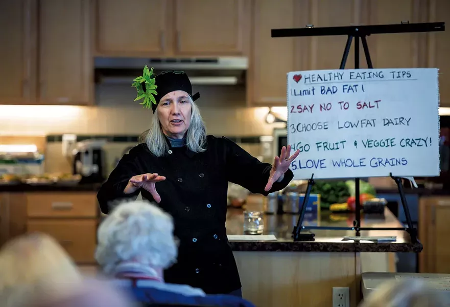 Chef Robin Burnett giving healthy eating tips during a Helping and Nurturing Diverse Seniors workshop at Thayer House in Burlington - GLENN RUSSELL