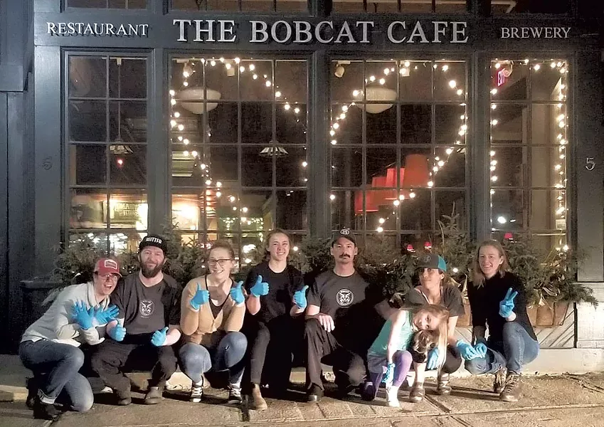 The team at The Bobcat Café & Brewery after finishing a night of takeout service - COURTESY PHOTO